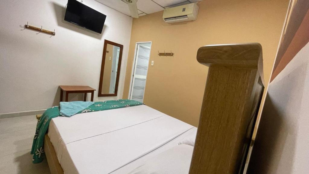 TV a/nebo společenská místnost v ubytování Hotel BJ Curumani