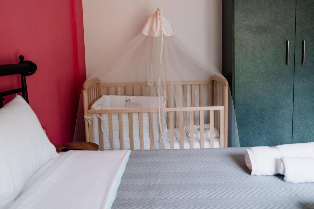Łóżko lub łóżka w pokoju w obiekcie Konatsi Luxury Apartments