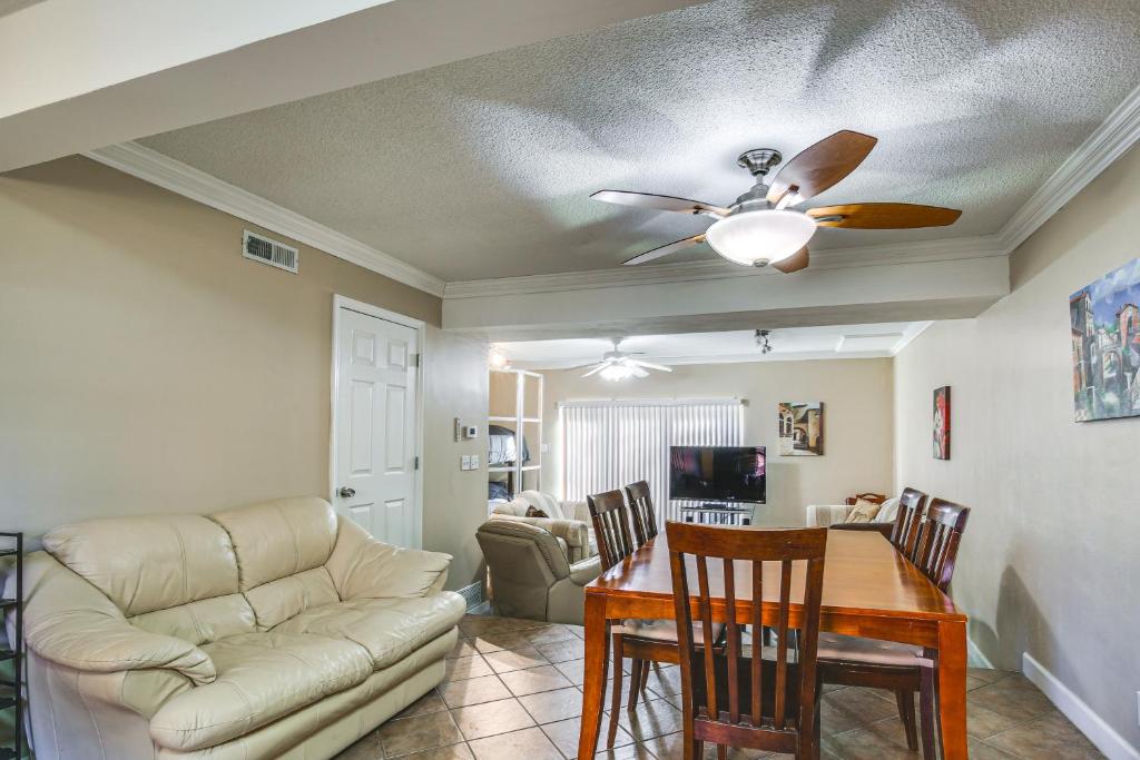 a living room with a couch and a table at St Ann Townhome Less Than 1 Mi to International Airport! in Edmundson