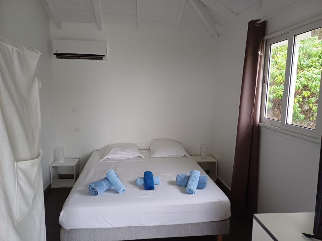 Postel nebo postele na pokoji v ubytování B. O. PARADIS SXM
