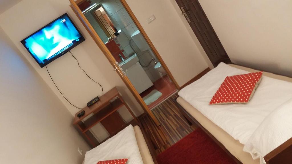 Postel nebo postele na pokoji v ubytování B&B Bazeni