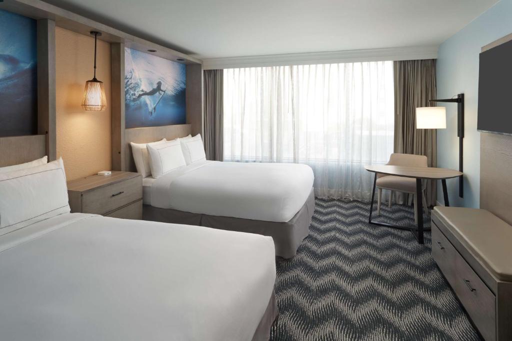 Postel nebo postele na pokoji v ubytování Hilton Cocoa Beach Oceanfront
