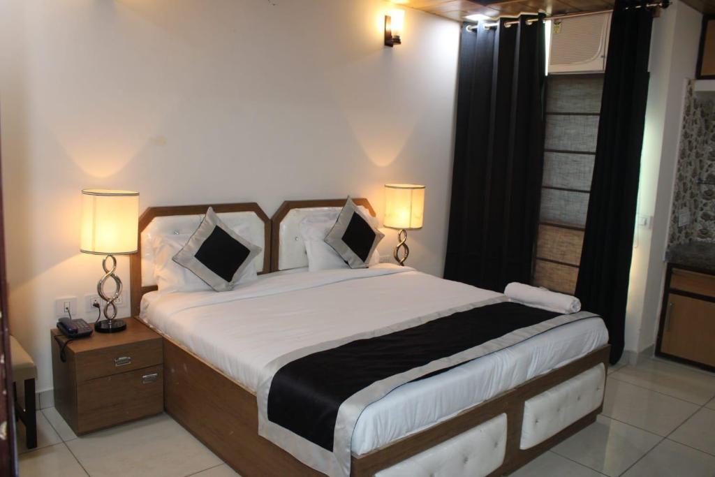 Krevet ili kreveti u jedinici u objektu Oyo Dream House