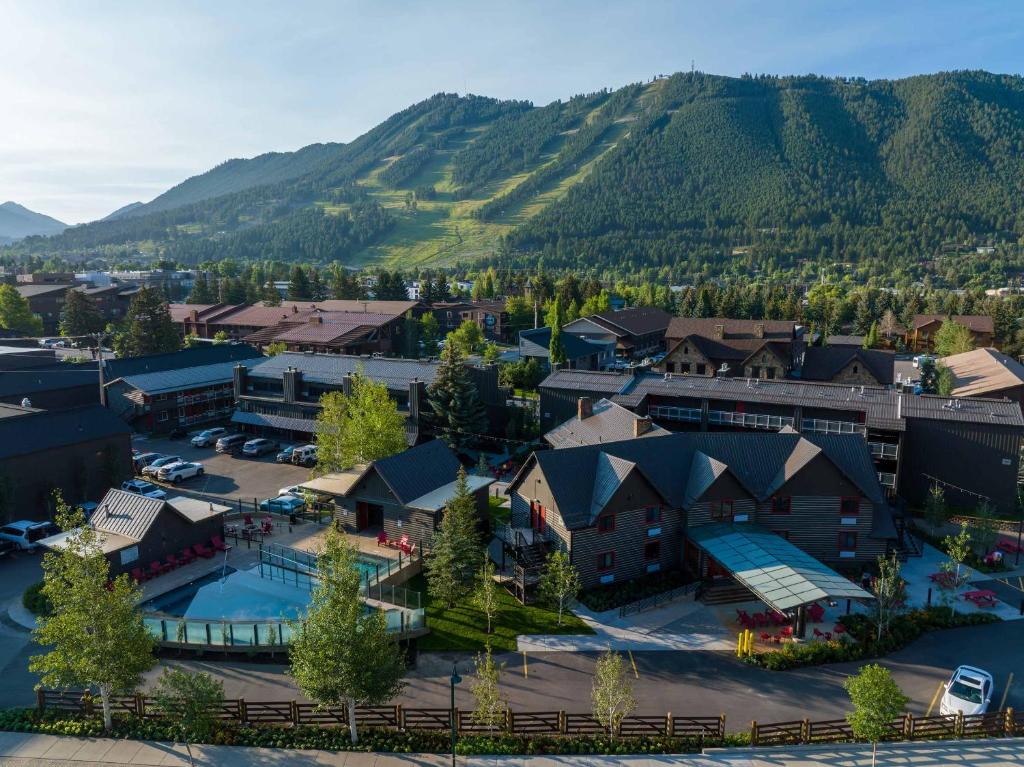 an aerial view of a resort with a mountain at Mountain Modern Motel in Jackson