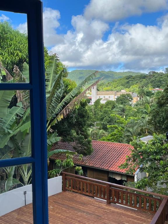 a view from the balcony of a house at Pousada Maikai Garden in Porto Belo