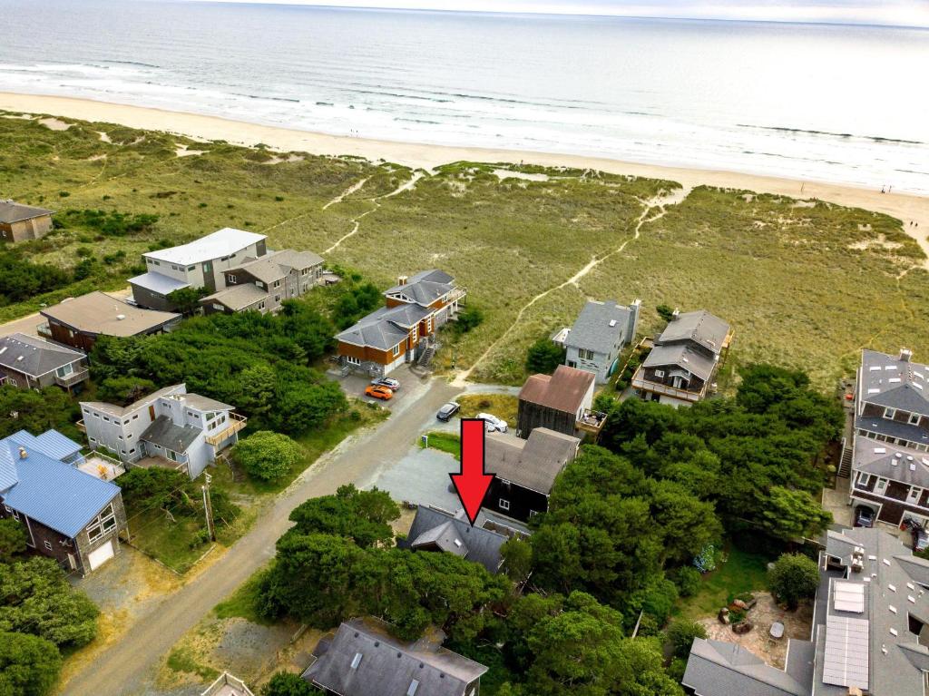 an aerial view of a house near the beach at Becalmed MCA#1653 in Manzanita