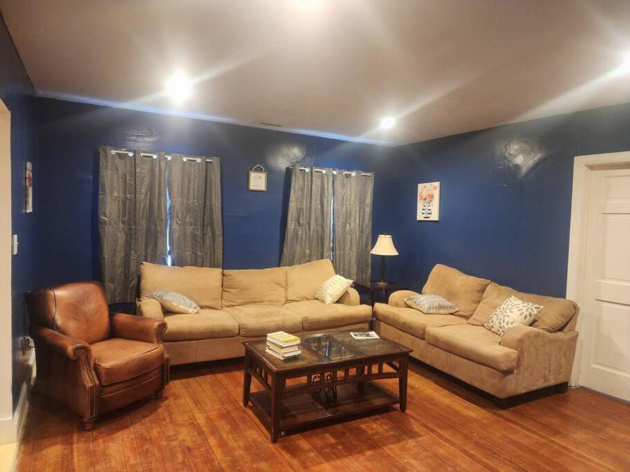 a living room with a couch and a coffee table at spacious and indulging in Meriden
