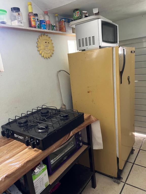 Kuchyň nebo kuchyňský kout v ubytování Hostal Casa Del Sol Comitan