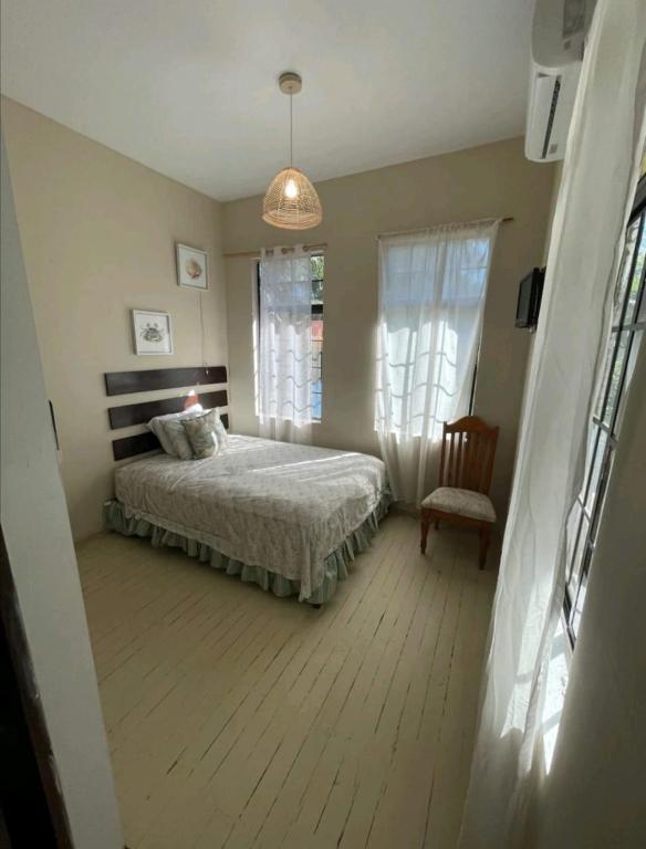 Postel nebo postele na pokoji v ubytování Casa de Diamantes