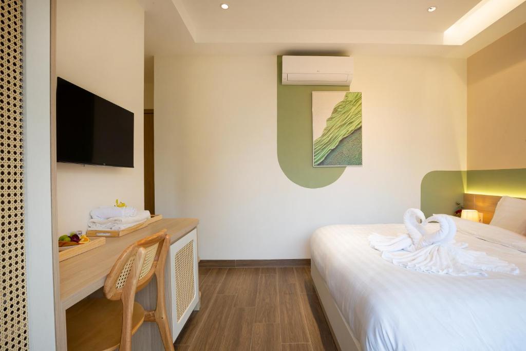 Postel nebo postele na pokoji v ubytování Sonder Homestay Quy Nhon