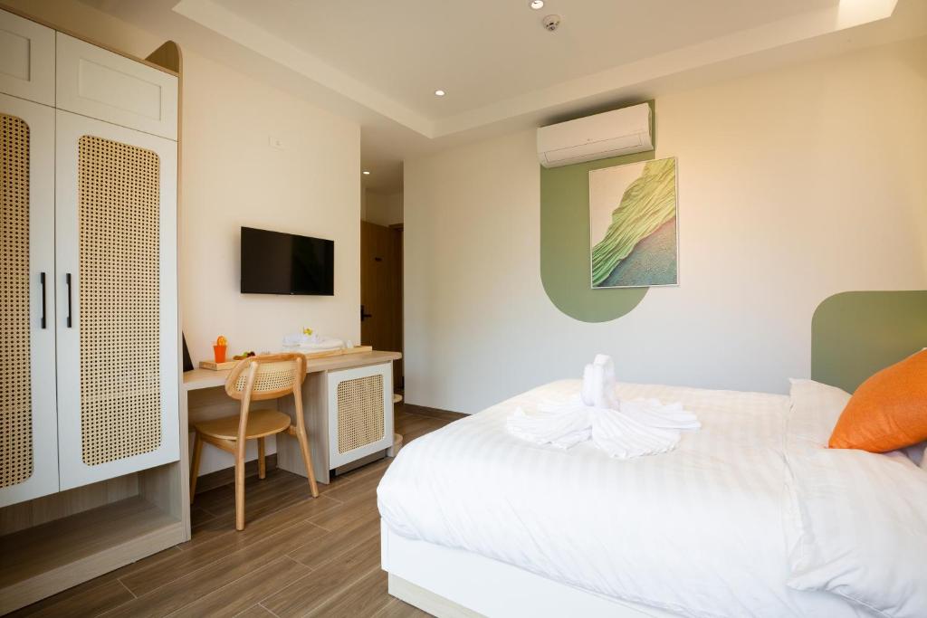 Postel nebo postele na pokoji v ubytování Sonder Homestay Quy Nhon
