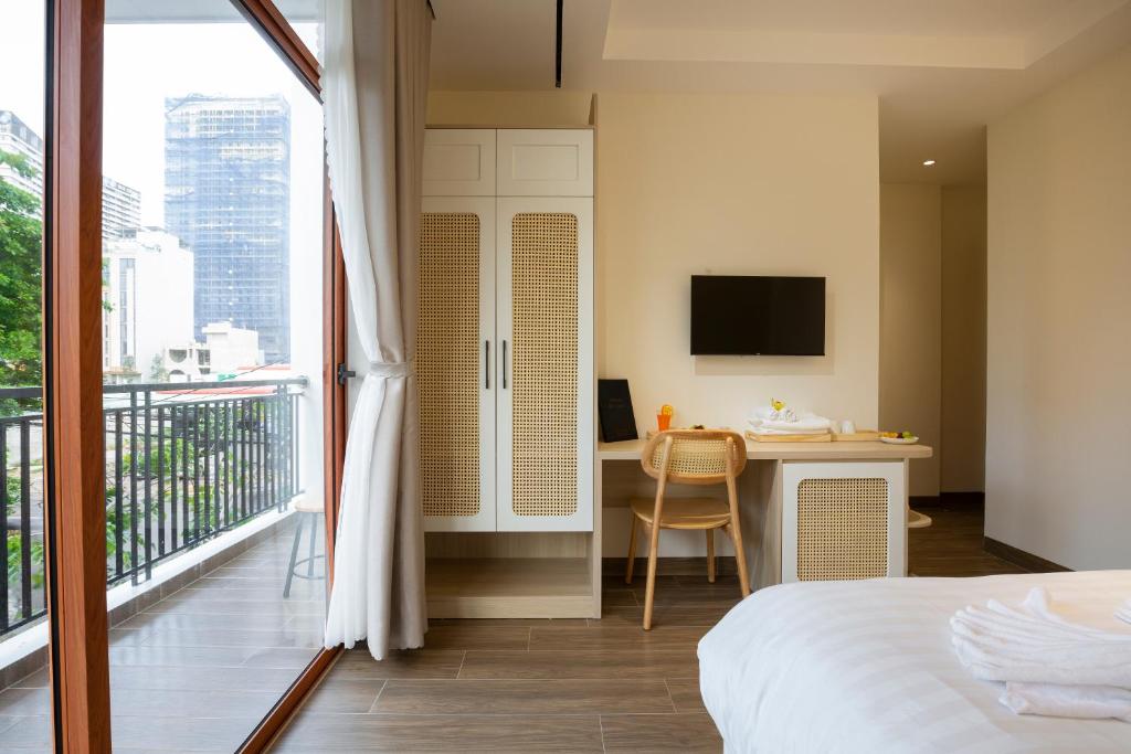 Postel nebo postele na pokoji v ubytování Sonder Homestay Quy Nhon