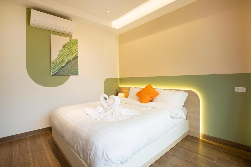 Postel nebo postele na pokoji v ubytování Sonder Homestay Quy Nhon