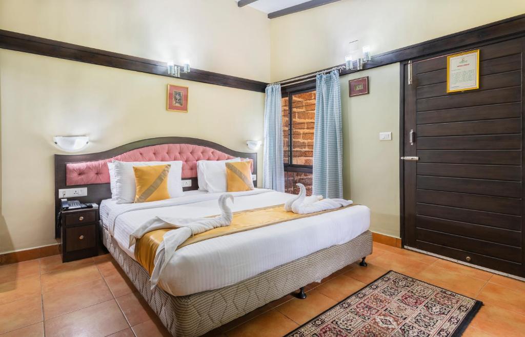 Postel nebo postele na pokoji v ubytování Toshali Sands Nature Escape Puri