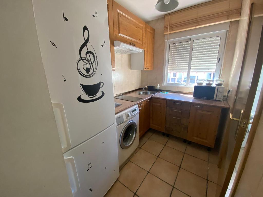 A kitchen or kitchenette at Casa Duna