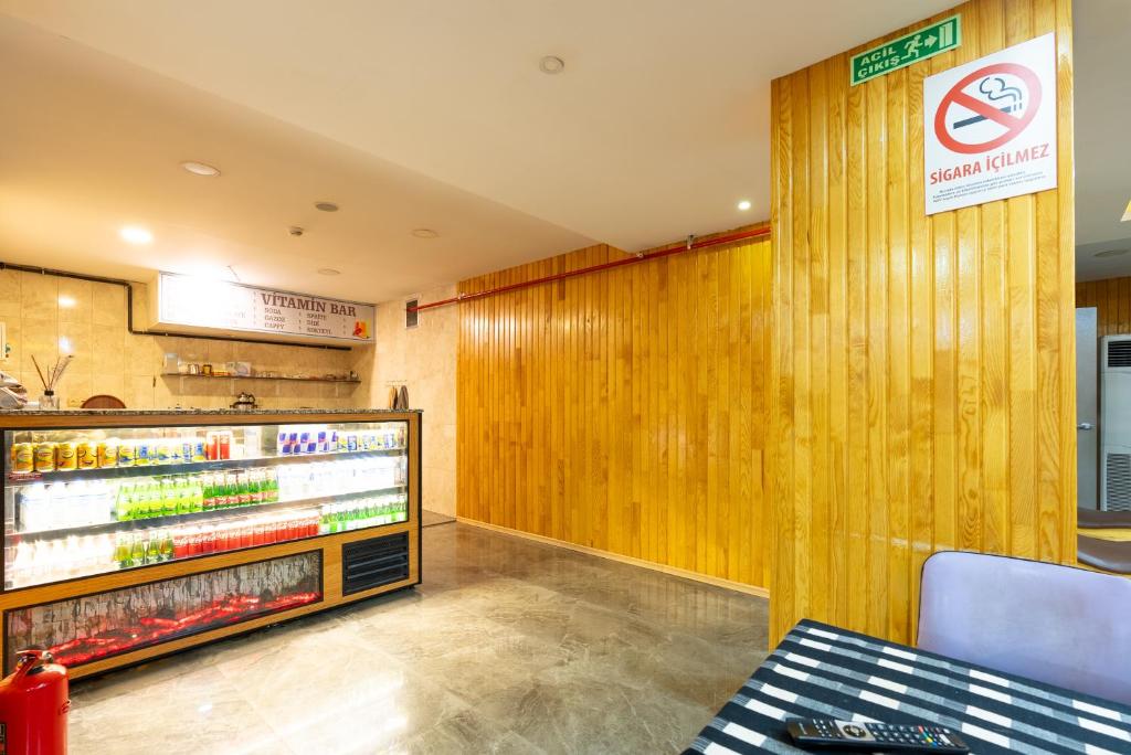 A kitchen or kitchenette at Valens Hotel Downtown
