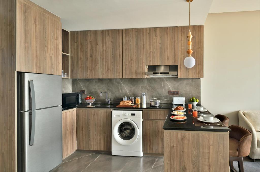 Kuchyň nebo kuchyňský kout v ubytování Citadines Paras Square Gurugram