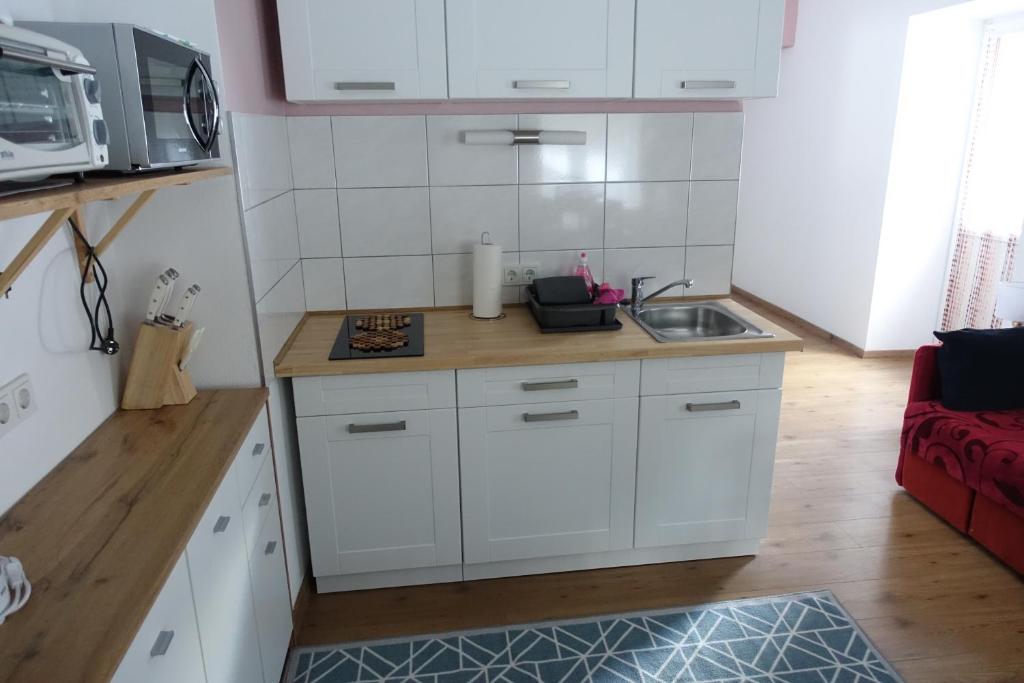 Kuchyňa alebo kuchynka v ubytovaní Apartmenthaus Kestel