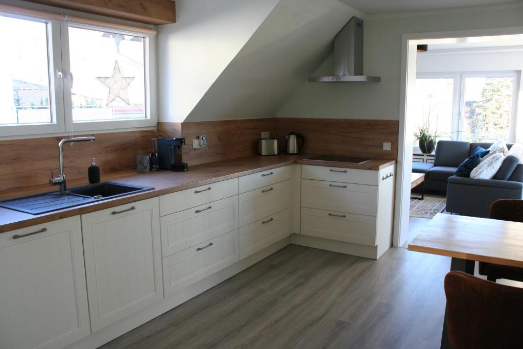 Kuchyň nebo kuchyňský kout v ubytování Ferienwohnung Löwenburg