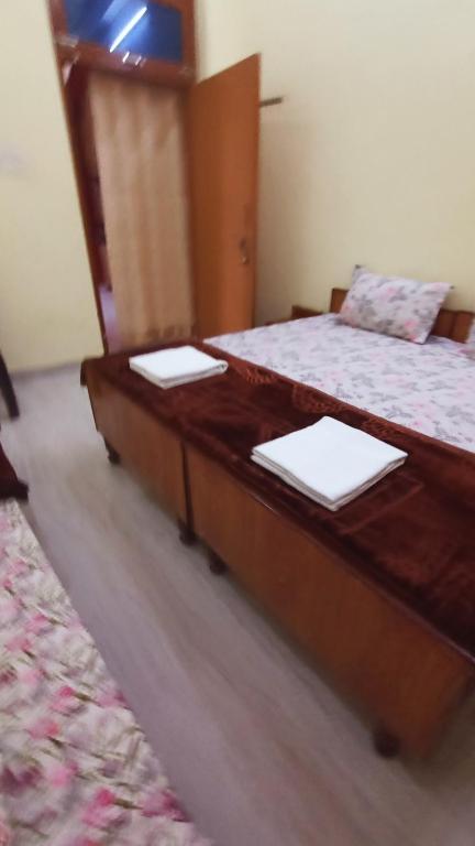 Voodi või voodid majutusasutuse ARJUN PAYING GUEST HOUSE toas
