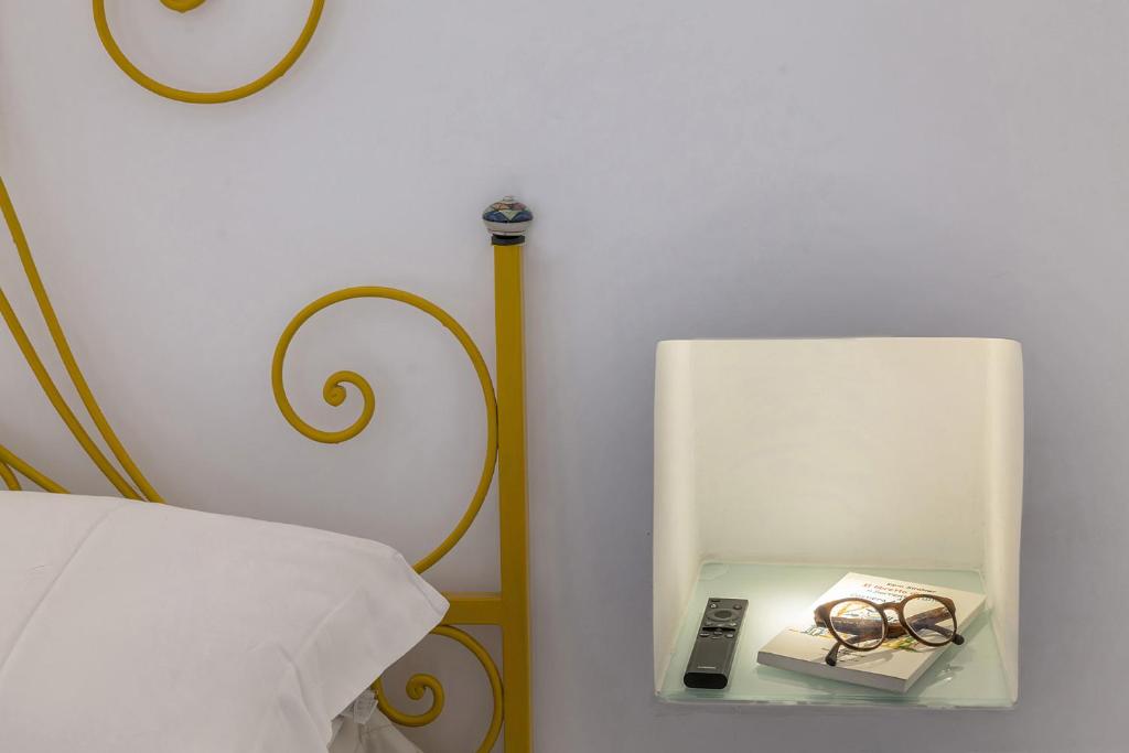 Postel nebo postele na pokoji v ubytování Gheba Suites