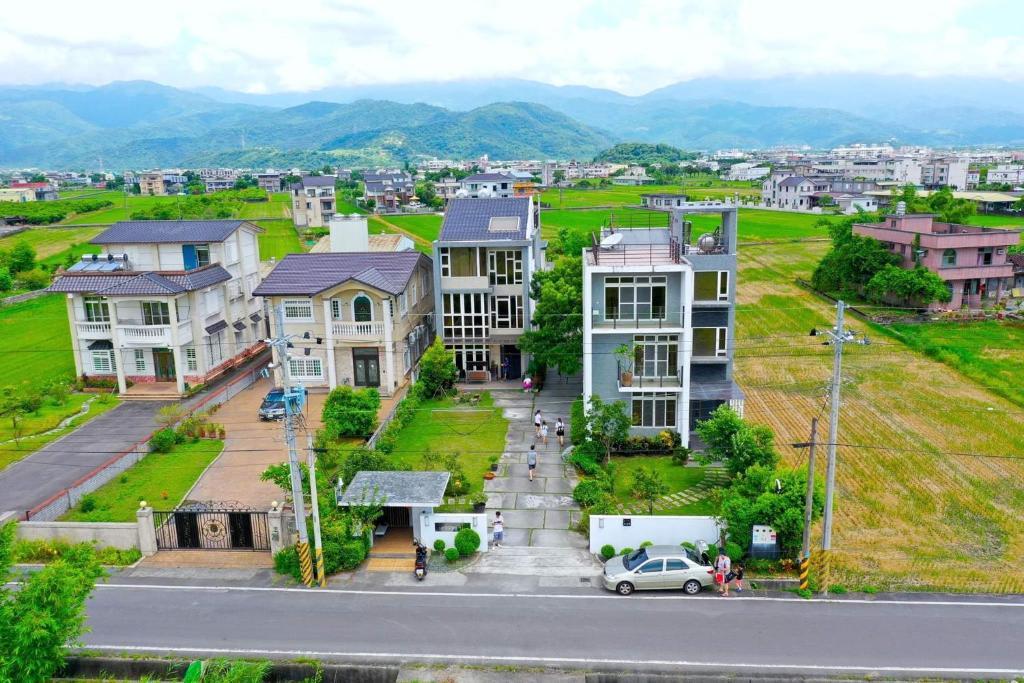 a view of a city with houses and a street at I Leisure B&amp;B in Yuanshan