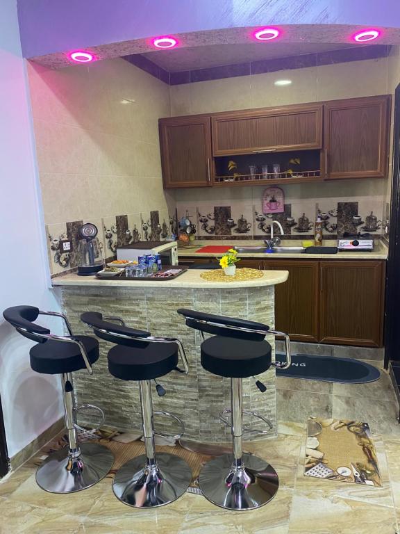 Kuchyň nebo kuchyňský kout v ubytování Petra Rose Apartment