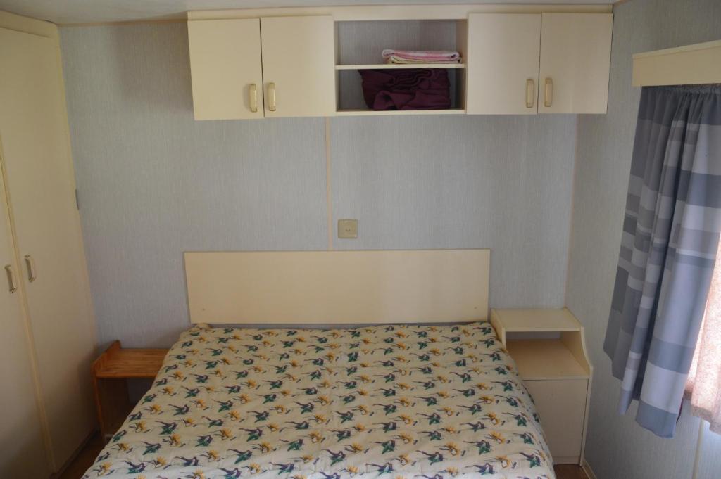 Postel nebo postele na pokoji v ubytování Camping Chon du Tarn