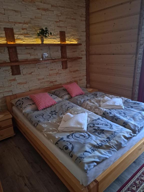 Postel nebo postele na pokoji v ubytování Penzion Havran