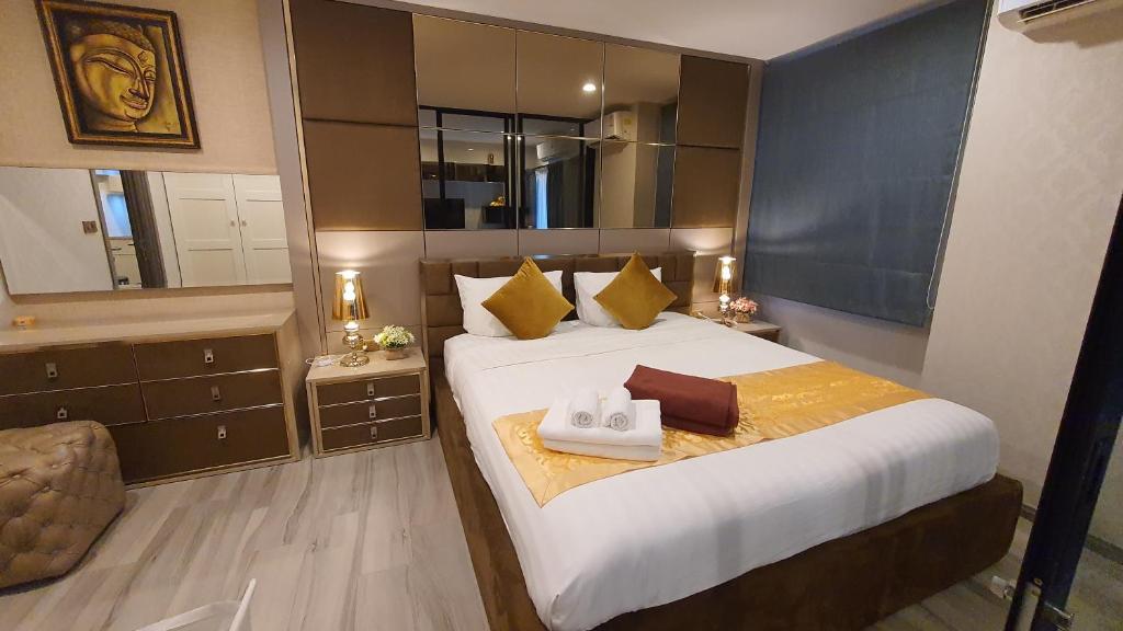Postel nebo postele na pokoji v ubytování F1 The Title Residencies Naiyang Phuket 1 Floor 1 Bdr