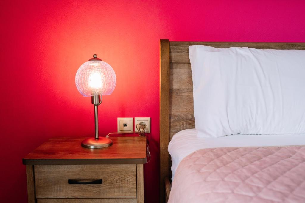 Łóżko lub łóżka w pokoju w obiekcie Konatsi Luxury Apartments