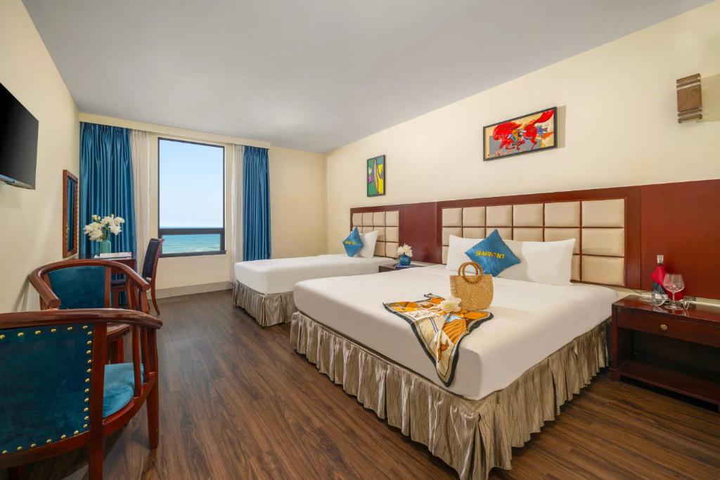 Postelja oz. postelje v sobi nastanitve SeaFront Hotel DaNang