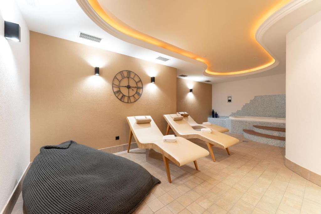 Postel nebo postele na pokoji v ubytování Hotel Mont Floris Obereggen