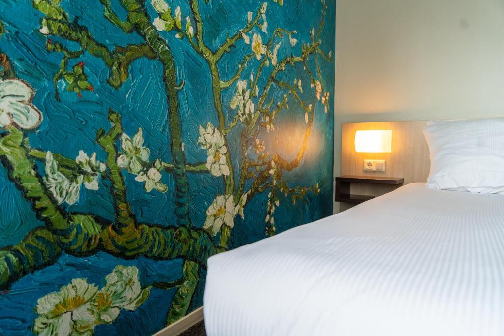 Postel nebo postele na pokoji v ubytování Kruller - Hotel B&B