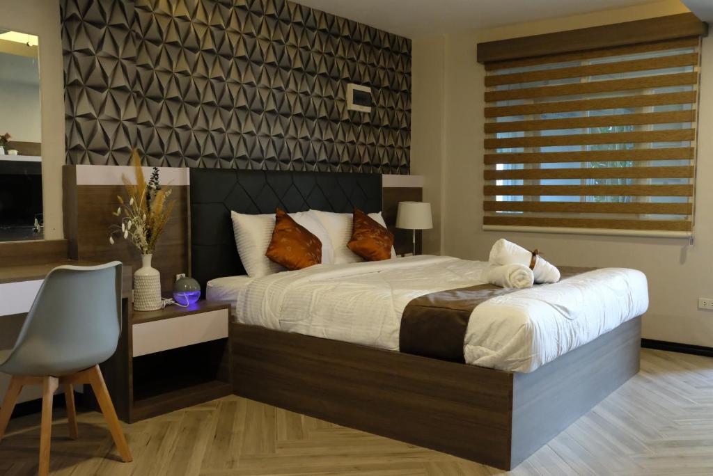 Postel nebo postele na pokoji v ubytování VIEDA HOTEL