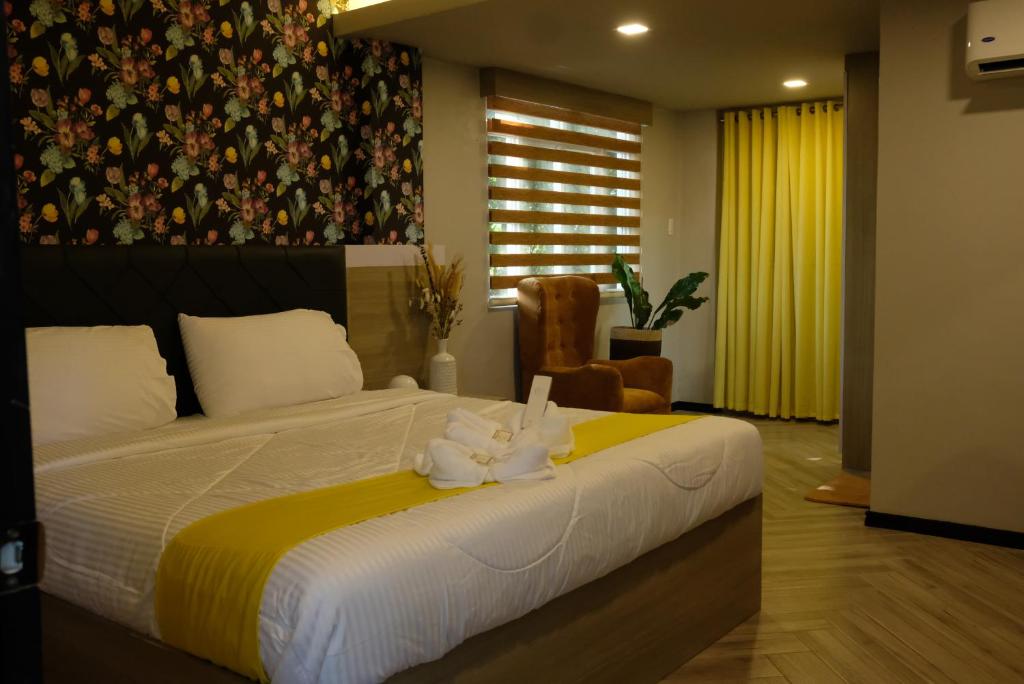 Postel nebo postele na pokoji v ubytování VIEDA HOTEL
