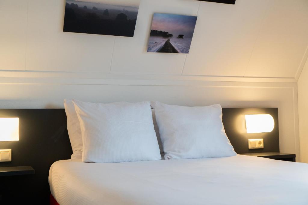 Postel nebo postele na pokoji v ubytování Kruller - Hotel B&B