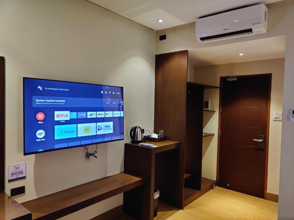 TV a/nebo společenská místnost v ubytování Altori Park Hotel