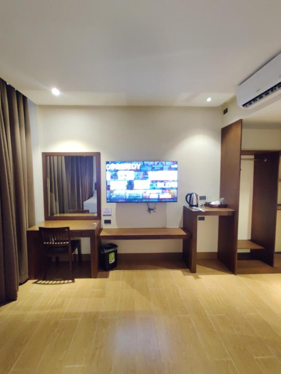 TV a/nebo společenská místnost v ubytování Altori Park Hotel