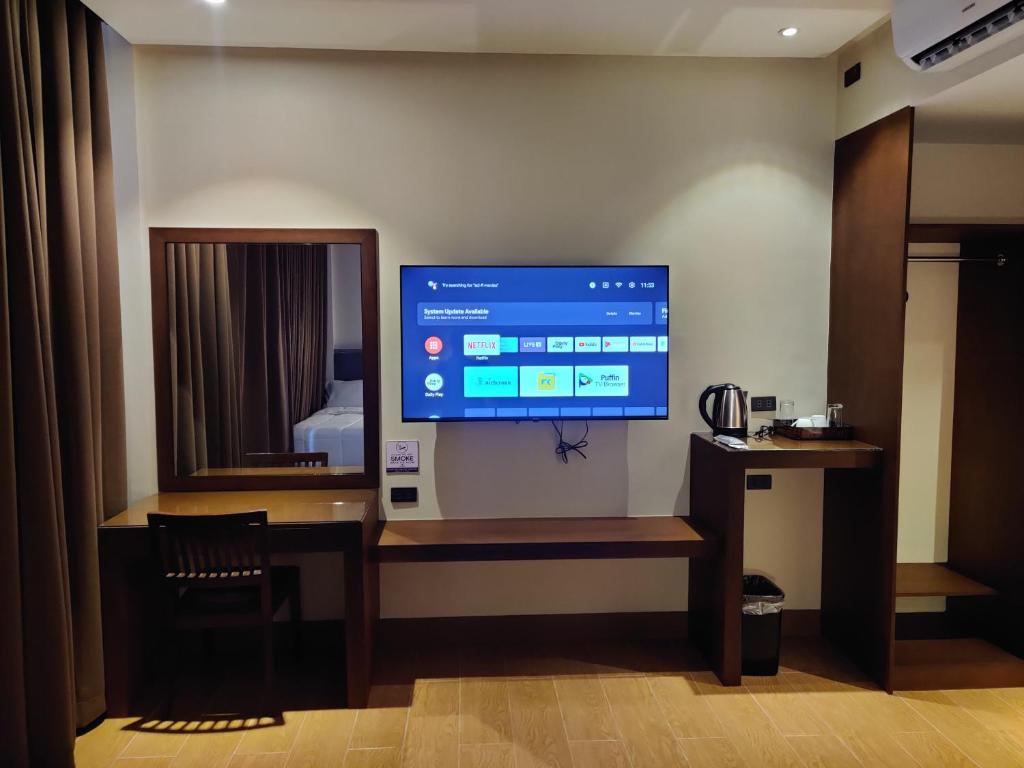 TV a/nebo společenská místnost v ubytování Altori Park Hotel