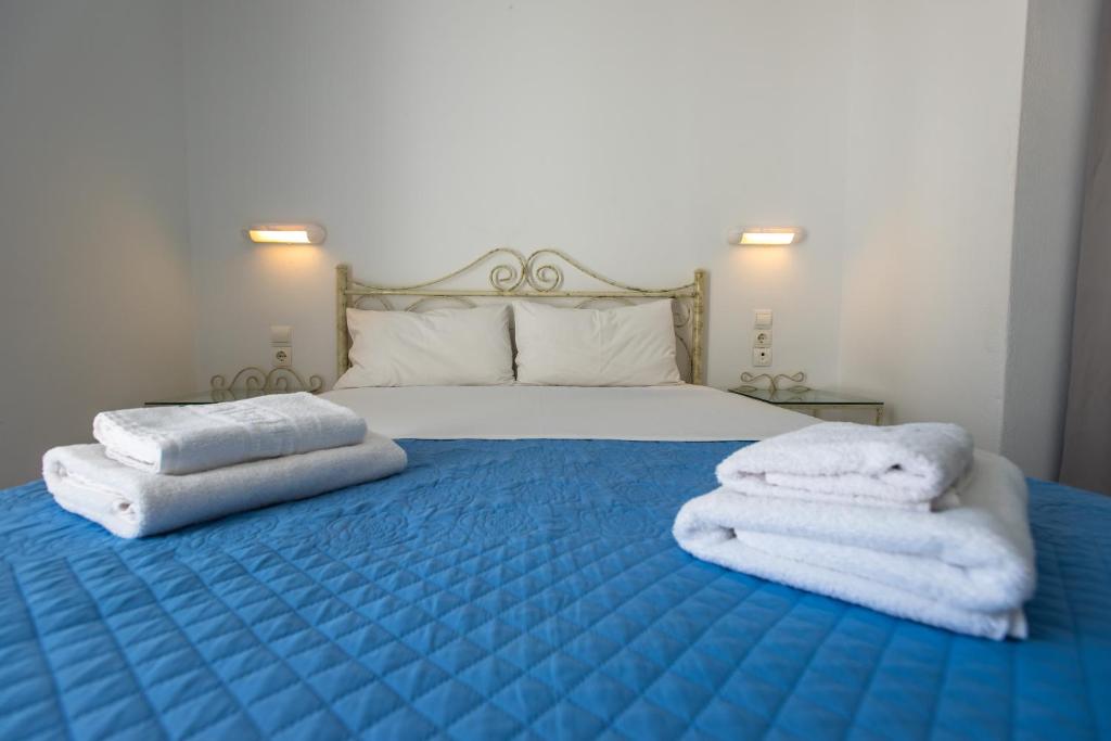 Posteľ alebo postele v izbe v ubytovaní V-rooms in Milos Cyclades