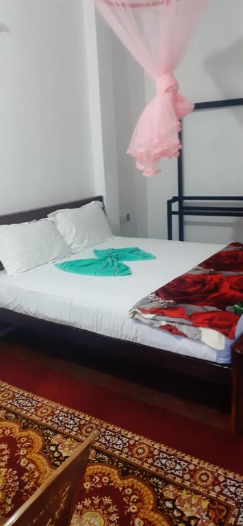 Postel nebo postele na pokoji v ubytování Daresh home stay