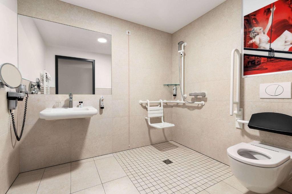 Ένα μπάνιο στο Amedia Linz, Trademark Collection by Wyndham