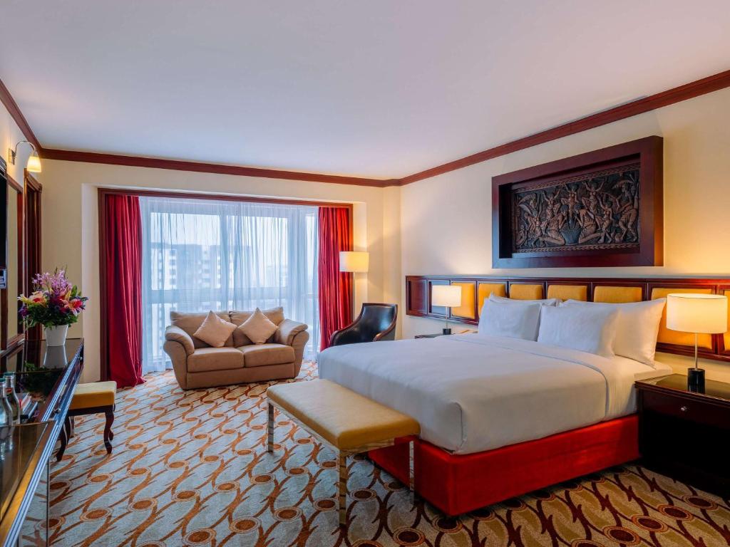 Postel nebo postele na pokoji v ubytování Mövenpick Hotel & Residences Nairobi