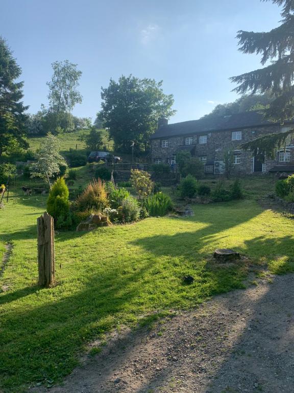 a view of the house from the garden at Pant-y-creolen in Llanfyllin