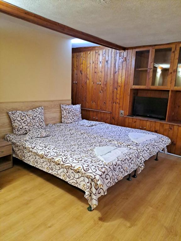 Postel nebo postele na pokoji v ubytování Kovacha Guest House