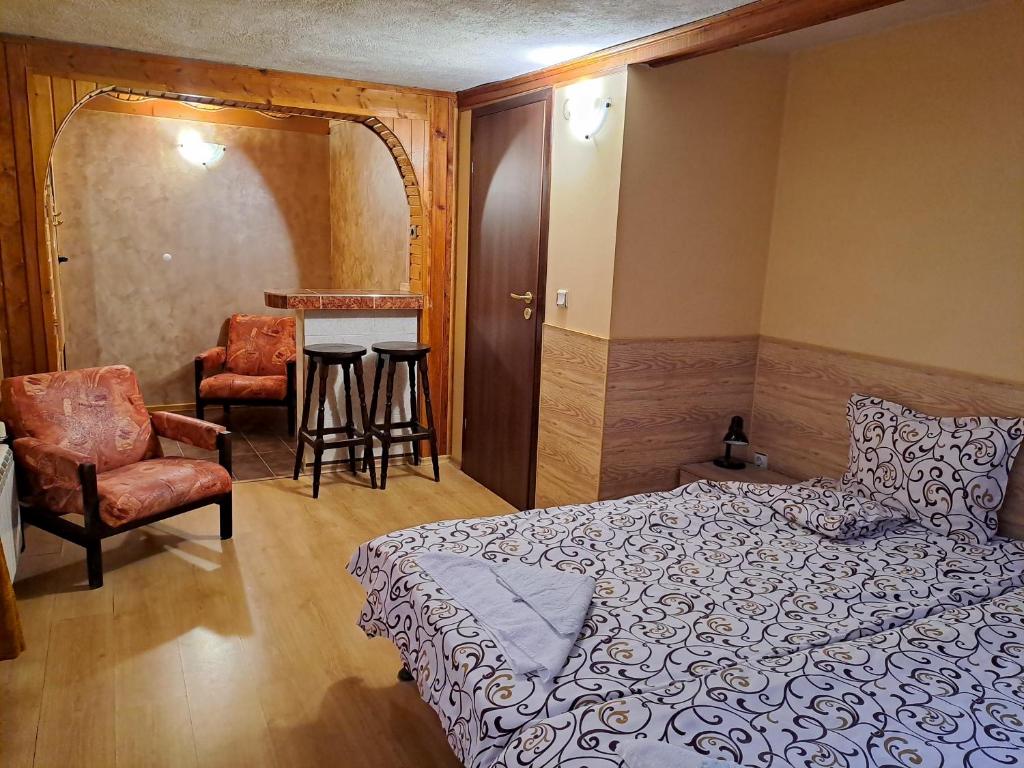 Postel nebo postele na pokoji v ubytování Kovacha Guest House