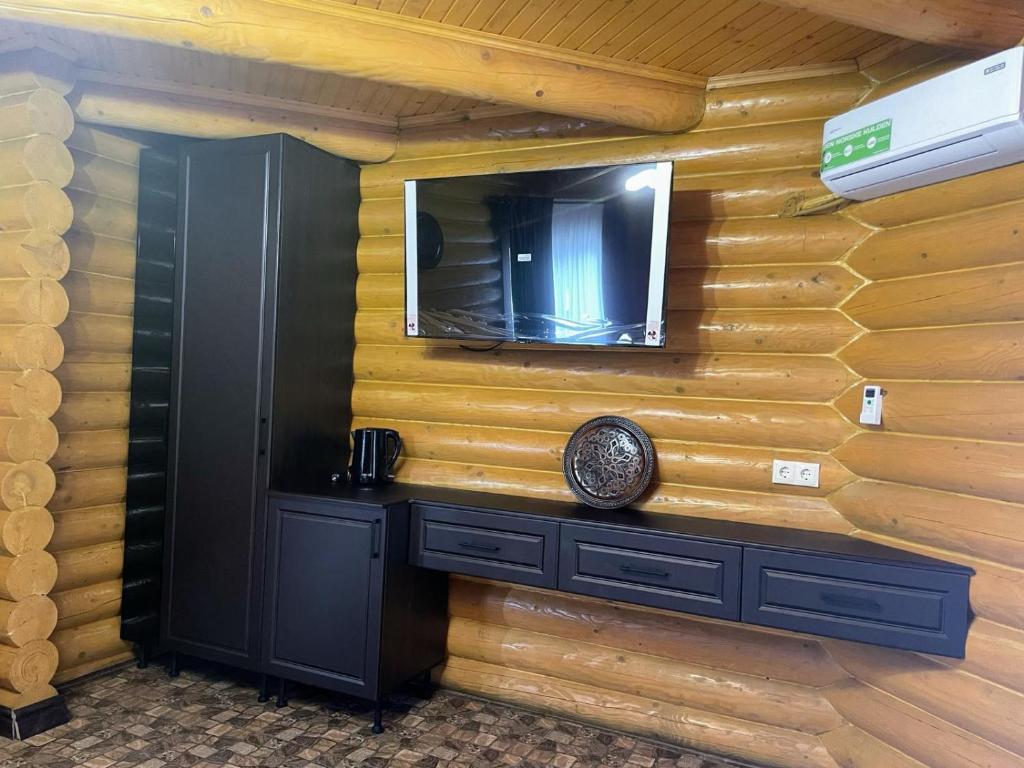 TV a/nebo společenská místnost v ubytování Hotel Ashad