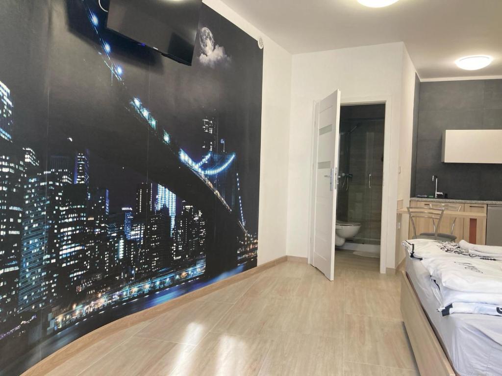 Postel nebo postele na pokoji v ubytování Apartamenty Św.Rocha