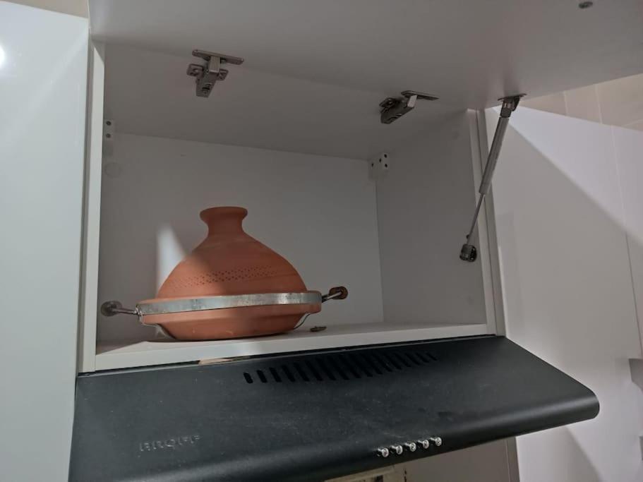 Kuchyň nebo kuchyňský kout v ubytování Superbe appartement neuf en résidence avec piscine